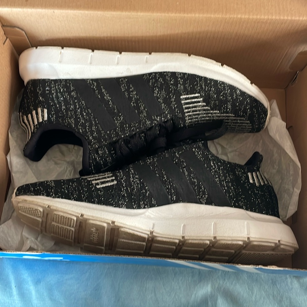 Adidas swift run women size 6.5 black with silver stitching and white sole